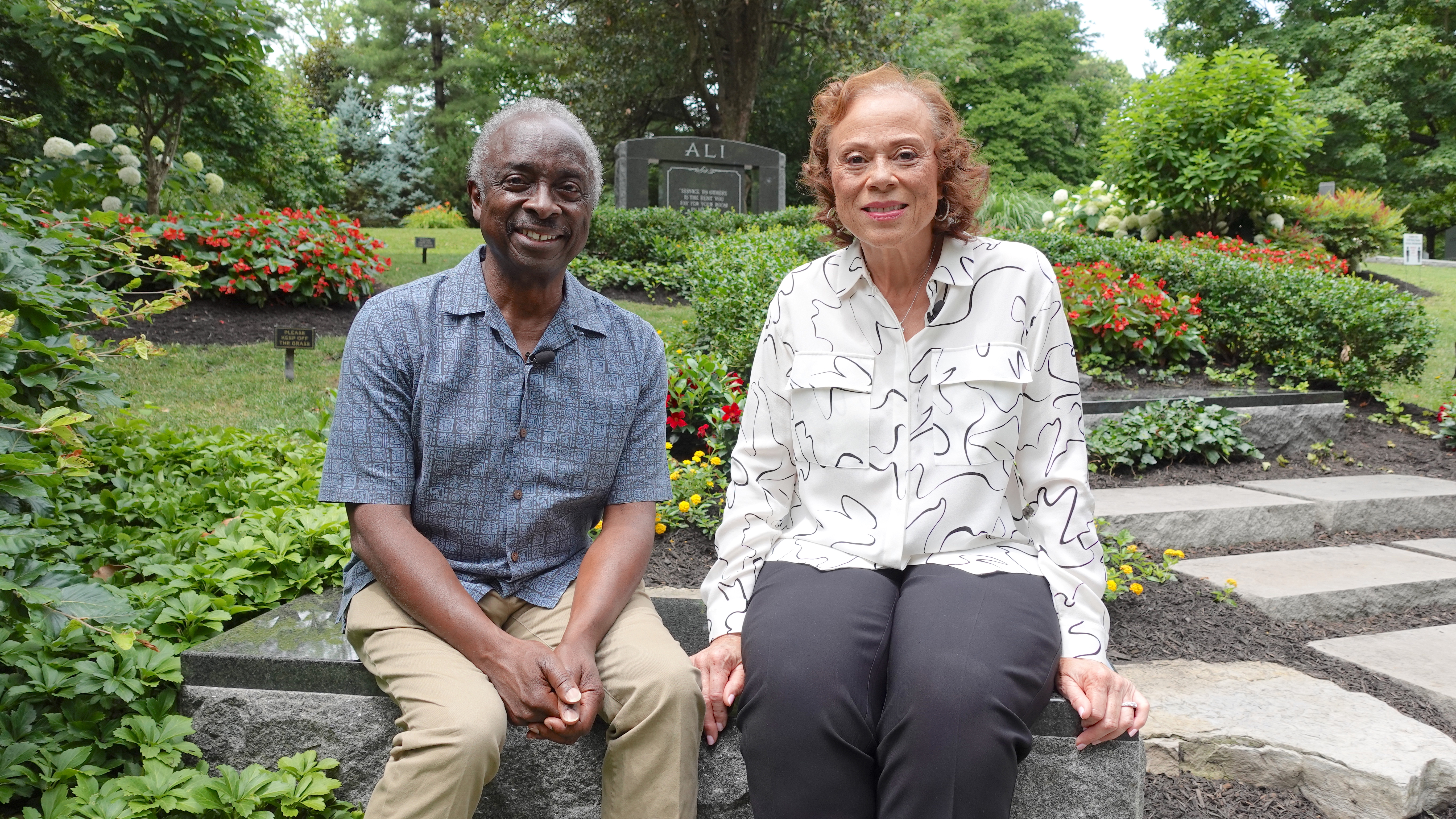 For “World’s Greatest Cemeteries” public television series: Host/Producer Roberto Mighty, with Mrs. Lonnie Ali, widow of Muhammad Ali, at Cave Hill Cemetery in Louisville, KY. Season 2-episode WCEM_201_Cave Hill Cemetery. Photo by Celestial Media LLC
